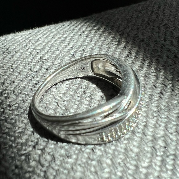 1/10 CT. T.W. Diamond Multi-Row Crossover Anniversary Band in Sterling Silver - Picture 6 of 7